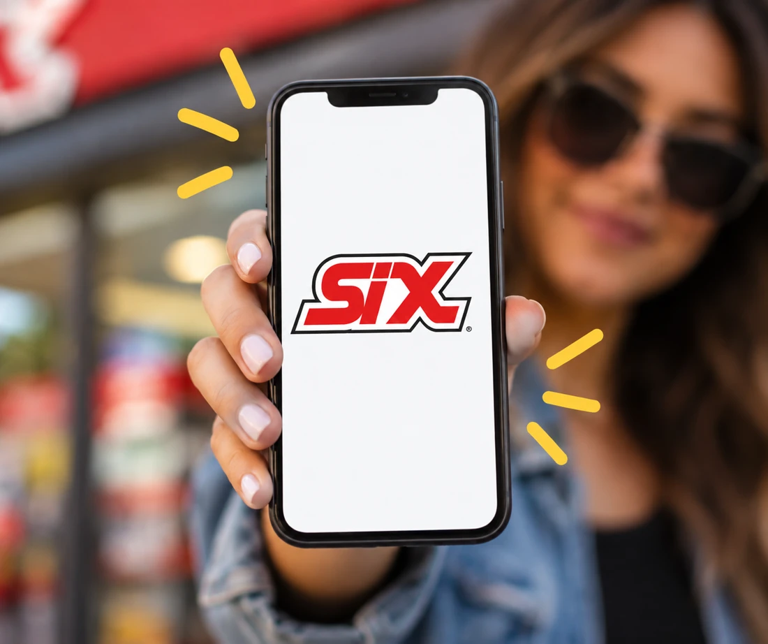 Teléfono mostrando el logo SIX